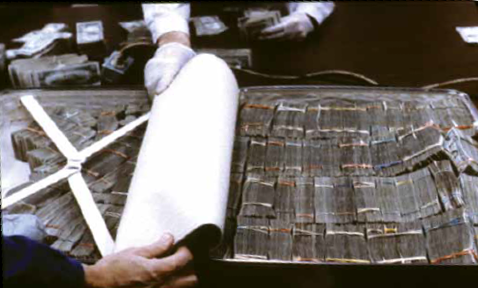 Each bundle of cash held bills of the same denomination, and the bundles in each shipment usually totaled the same amount so launderers could easily approximate the full amount of cash in a suitcase.