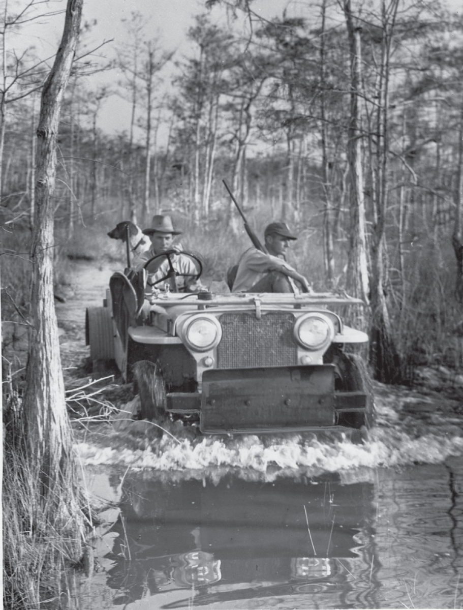Hunters riding a swamp buggy...YEEHAW!