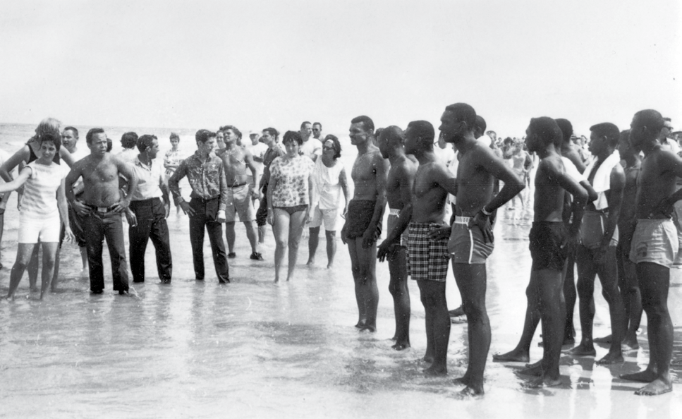 Segregationists and black demonstrators at a white-only beach in Saint Augustine, Florida